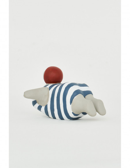 Figura cemento bañista espalda
