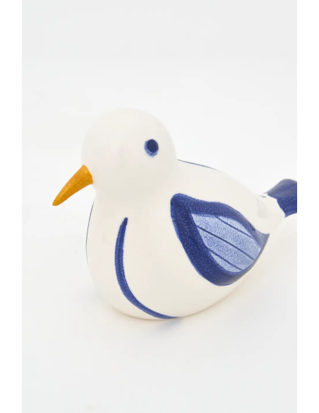  Pájaro de cerámica blanco y azul 