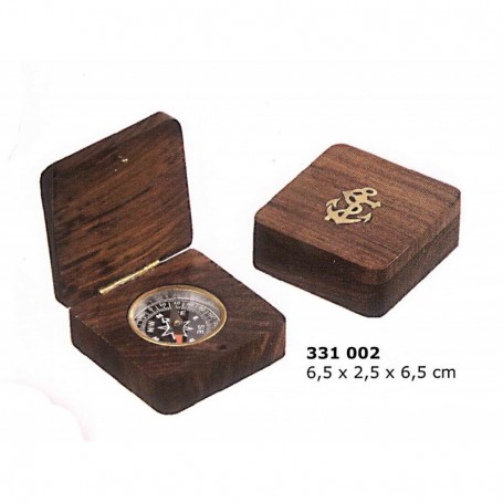 Brújula pequeña encastada en caja de madera