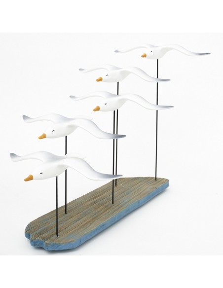Bandada gaviotas marinas de madera